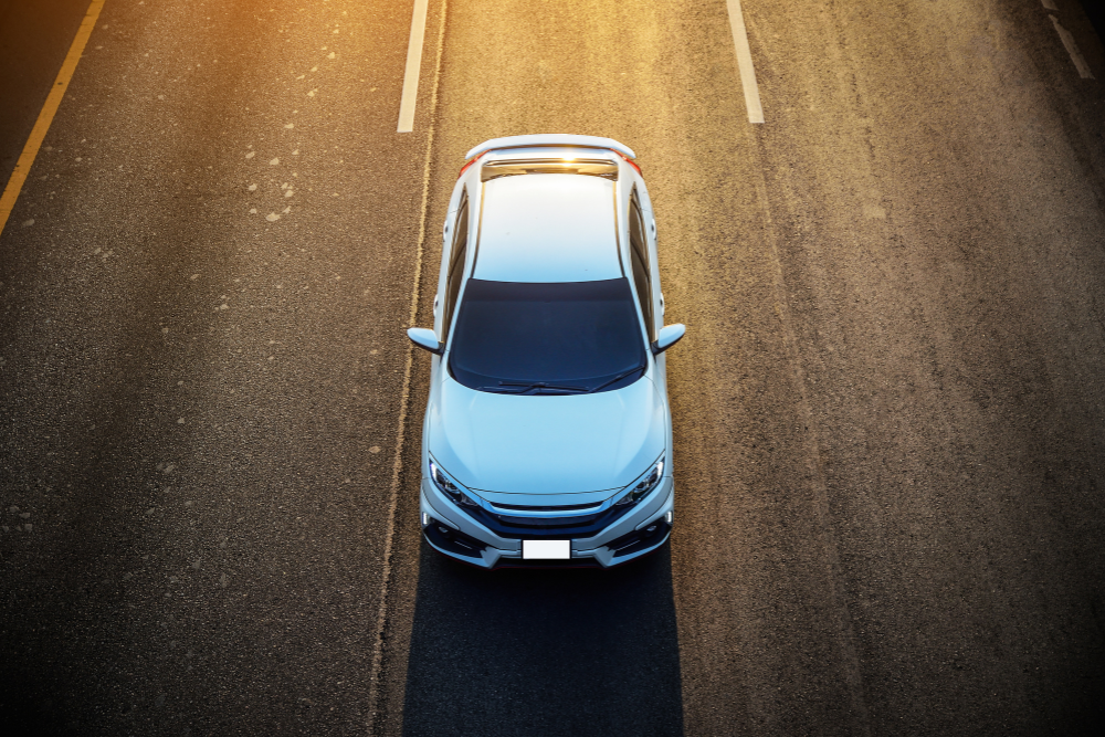 Image of late spouse's blue car on the road